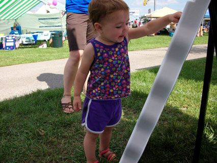 Toddler Plays the Mini Plinko Board